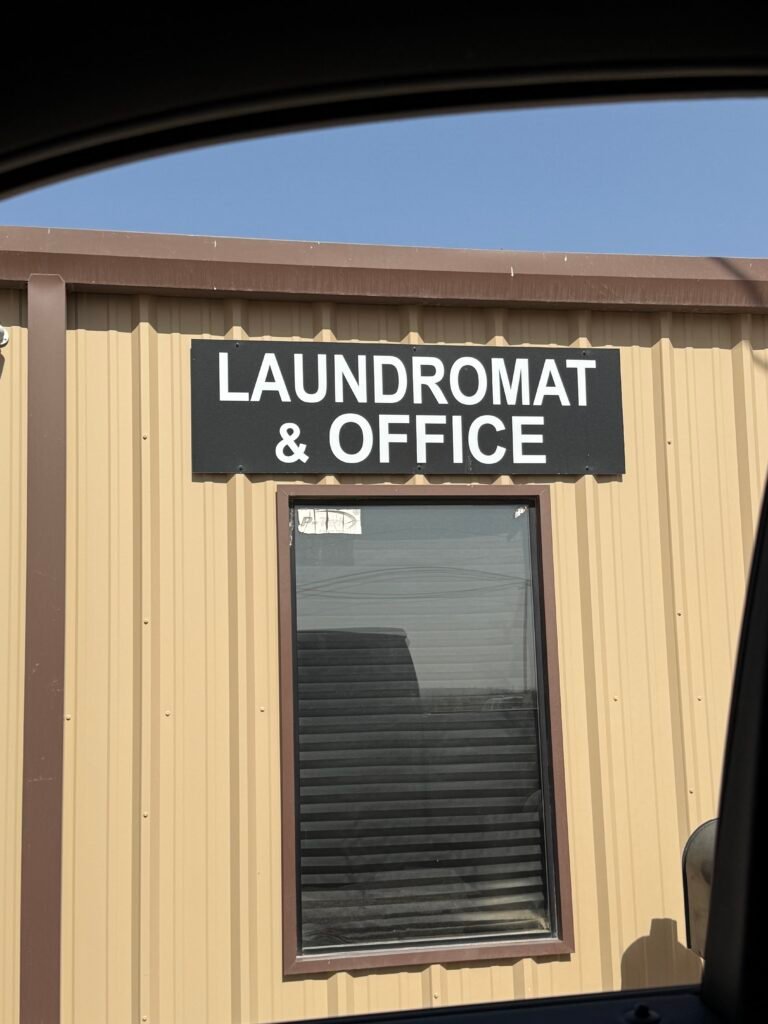 sunshine laundromat sign